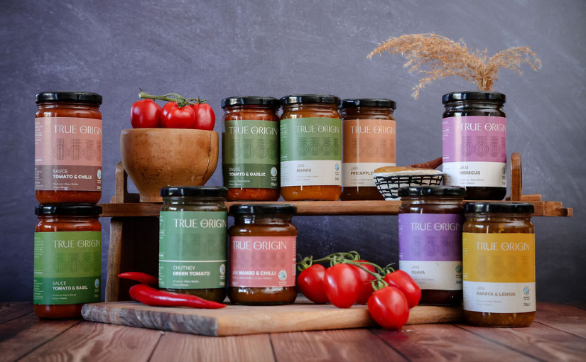 The True Origin Meru Herbs range arranged together on a table against a blue background