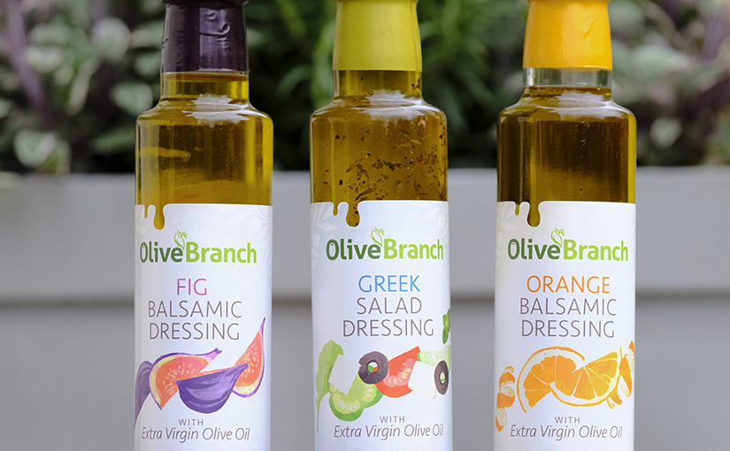 Three Olive Branch salad dressings stood side by side
