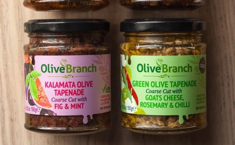 Two jars of Olive Branch tapenade shot from above